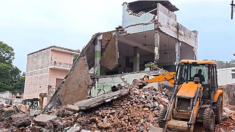 A mosque, located inside the District Magistrate's office complex, being demolished, in Saharanpur, Uttar Pradesh.