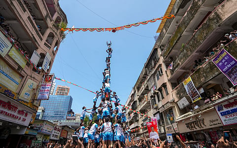 Govinda Pathaks' form a human pyramid during a 'Dahi Handi' event organized on the 'Janmashtami' festival, at Dadar, in Mumbai, Saturday, Sept. 5, 2026