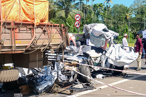 Thrissur: People gather near wreckage of a car after it collided with a lorry parked on the highway at Kaipamangalam, in Thrissur district, Keralam, Saturday, Sept. 5, 2026. Eight engineering students from Tamil Nadu's Dindigul were killed in the tragic road accident.