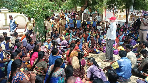 Cleanliness workers on sit-in protest in the Karur Collectorate premises on September 7.