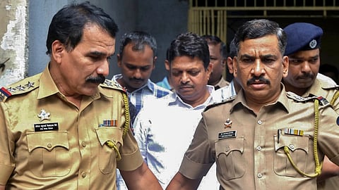 Shiv Sena corporator Ramesh Mhatre being produced before a court under heavy police security after being remanded, along with his three aides, to police custody till July 13th following their arrest for allegedly assaulting two doctors and medical staff at a civic-run hospital, at Kalyan, in Thane district, Maharashtra, Friday, July 10, 2026