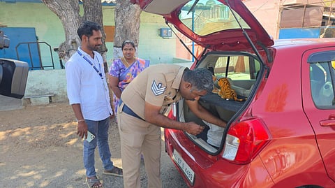Cops conducting a vehicle check as election model code kicks in Dharapuram on Tuesday