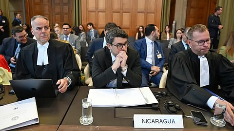 Members of the legal delegation representing Nicaragua, including counsel and advocate Daniel Mueller, right, attend public hearings on the preliminary objections raised by Germany in the case brought by Nicaragua at the International Court of Justice (ICJ) at the Peace Palace in The Hague, Netherlands, Monday, Sept. 7, 2026.