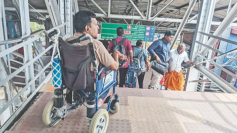 A wheelchair user, whose movement has been hampered due to access issues at the Egmore railway station