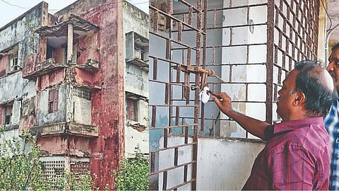 TNHB officials sealing a dilapidated apartment