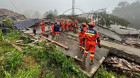 Rescuers conduct a rescue operation at the site of a mudslide following days of heavy rain from tropical cyclone Saudel in Suichuan County of Ji'an City
east China's Jiangxi Province