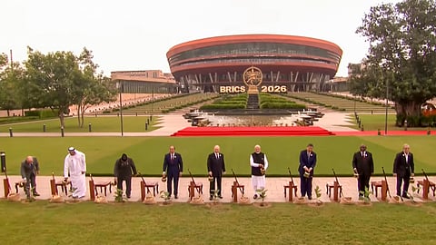 Brazil's Foreign Minister Mauro Vieira, Abu Dhabi Crown Prince Sheikh Khaled bin Mohamed bin Zayed Al Nahyan, Indonesian President Prabowo Subianto, Egyptian President Abdel Fattah el-Sisi, Russian President Vladimir Putin, Prime Minister Narendra Modi, Chinese President Xi Jinping, South African President Cyril Ramaphosa, Iranian President Masoud Pezeshkian and Ethiopian Prime Minister Abiy Ahmed Ali during a joint tree plantation initiative amid the ongoing 18th BRICS Summit, at the Bharat Mandapam, in New Delhi