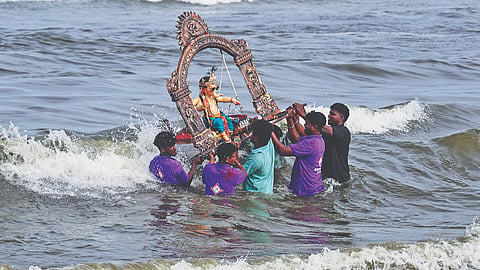 Lord Ganesh's idol being taken for immersion