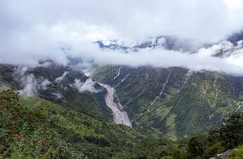 The Trishuli river flows through a flood-affected valley in the aftermath of the recent flash floods, at Grang, in Rasuwa district, Nepal, Wednesday, Sept. 2, 2026.