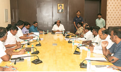 Transport Minister Vijay Tamilan Parthiban chairing a review meeting on Monday
