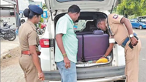 Flying squad checking a car in Madurantakam