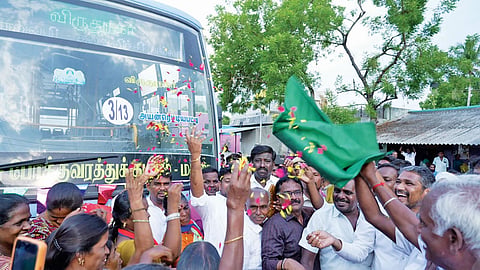 Social Justice Minister Vanni Arasu flagging off the maiden bus to his native village, Ayanrettiyapatti, in Virudhunagar on September 14.