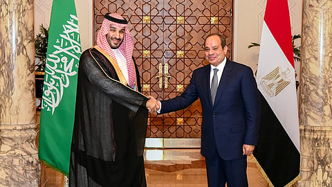 In this photo provided by the Egyptian Presidential Press Office, Saudi Crown Prince Mohammed bin Salman, left, and Egyptian President Abdel-Fattah el-Sissi, shake hands at the Presidential Palace in Cairo, Egypt, Tuesday, Sept. 15, 2026.