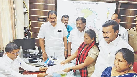 Dharapuram DMK candidate Suganya filing nomination papers in the presence of former minister MP Saminathan on Tuesday