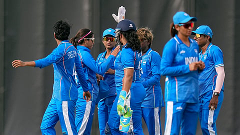 India's Richa Ghosh, Sree Charani and teammates during the Asian Games fourth Women's Quarter final cricket match against Japan, in Nisshin, Japan
