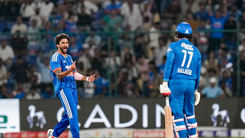 India's Nitish Kumar Reddy celebrates the wicket of Afghanistan's Mujeeb Ur Rahman during the third and final T20I cricket match between India and Afghanistan, in New Delhi