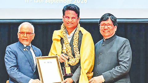 VIT vice-president Sekar Viswanathan receiving the honour