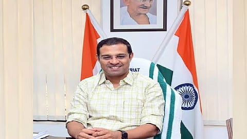 Minister Roji John