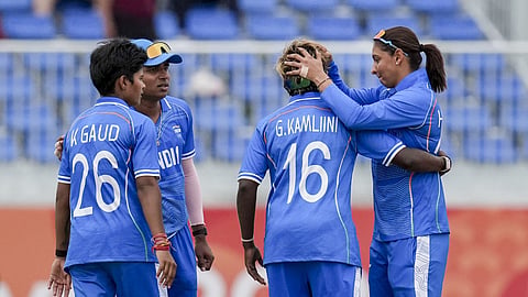 India's captain Harmanpreet Kaur, right, with Gunalan Kamalini, second right, and teammates celebrates after a wicket during the second semifinal T20I cricket match between India's women and Bangladesh's women in the ongoing Asian Games 2026, at Aichi Prefectural Korogi Sports Park in Nisshin, Japan.
