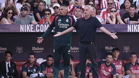 Real Madrid head coach Jose Mourinho (R)