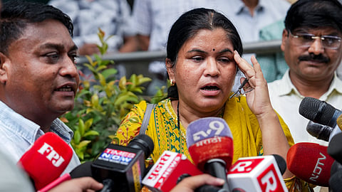 Ravindra Wakode, father of IIT Bombay student Sahil Wakode, interacts with media personnel after visiting the Crime Branch office in connection with his son's death case, in Mumbai