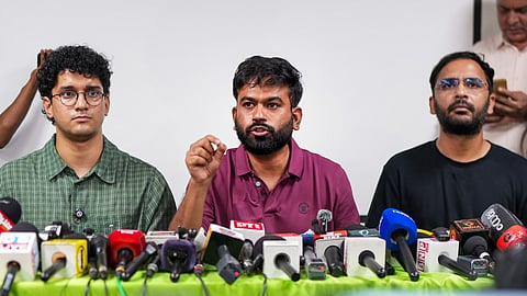 Cockroach Janta Party (CJP) founder Abhijeet Dipke addresses a press conference as Co-conveners Saurav Das and Ashutosh Ranka look on, in New Delhi, Thursday, Sept. 24, 2026