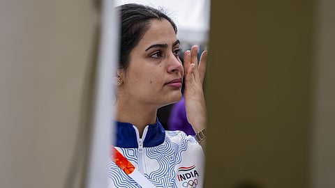 India's Manu Bhaker reacts after competing in the 10m Air Pistol Women final round during the 20th Asian Games, in Nagoya, Japan.
