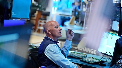 World shares mostly advance after global bond sell-off, drop in oil prices