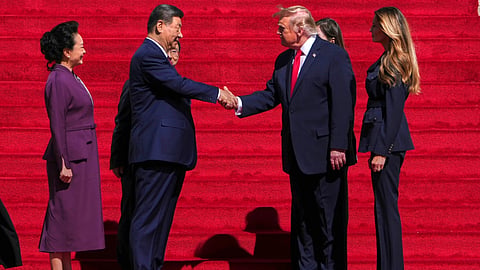 Chinese President Xi Jinping (L), US President Donald Trump (R)
