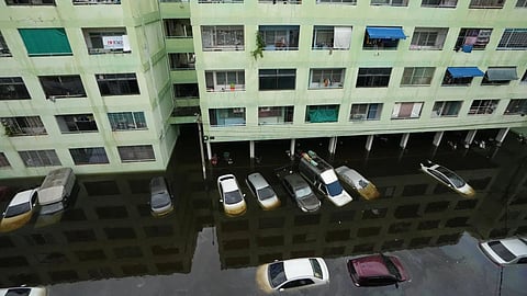The streets are flooded after a heavy rain, in Bangkok, Thailand.