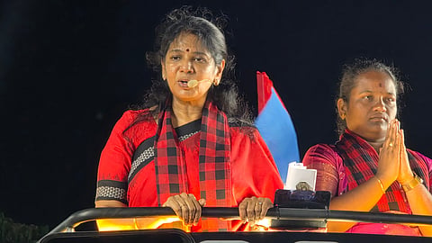 Campaigning for DMK candidate Suganya in the Dharapuram bypoll, Kanimozhi said the TVK government’s “drama and reels” would not last long 