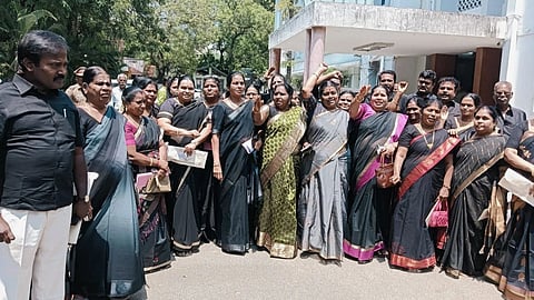 DMK members in black stage a walkout during the Tiruchy Corporation meeting on September 29.