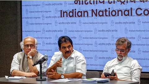 Congress Working Committee members addressing the reporters during a press conference.