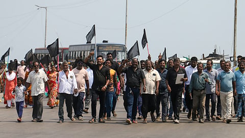 Fishermen staged a protest and raised black flags at Srinivasapuram in Chennai against the Tamil Nadu government's proposed construction of a new Secretariat complex in Pattinapakkam.