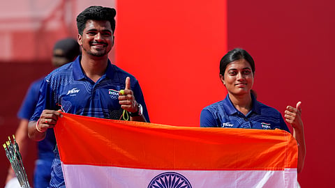  India's Sahil Jadhav, left, and Chikitha Taniparthi celebrate after winning the compound mixed team archery gold medal match against Korea during the 20th Asian Games, in Nagoya, Japan, Wednesday, Sept. 30, 2026