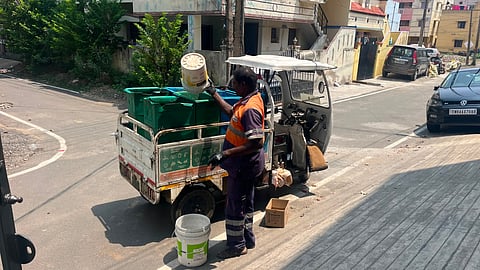 Cleanliness worker collecting segregated waste in a BOV vehicle in the Alandur zone on Wednesday