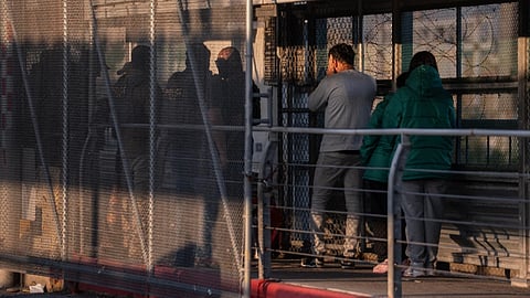 A group of undocumented migrants is deported by U.S. Immigration and Customs Enforcement agents across the McAllen-Hidalgo-Reynosa International Bridge in McAllen, Texas