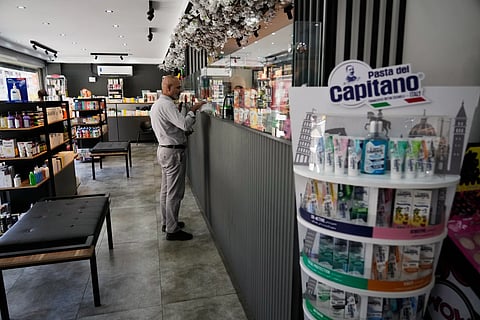 Man in pharmacy in Terhan