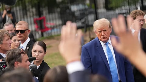 President Donald Trump speaks to reporters at the White House in Washington