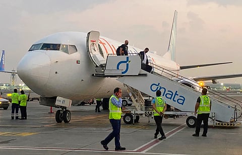 Israeli tourists leave a FlyDubai plane which departed from Ben-Gurion International Airport in Tel Aviv and landed in Dubai, United Arab Emirates