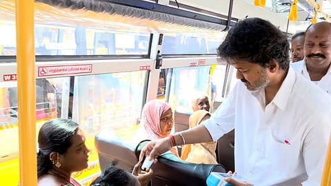 CM Vijay issues a bus ticket to a passenger under the Vettri Payanam scheme in Chennai.