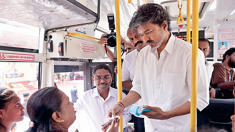 CM Vijay issues a free travel ticket to a passenger on October 2.