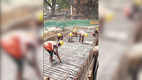 Greater Chennai Corporation workers engaged in rainwater drainage construction in Korattur