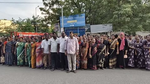 Amma Unavagam workers stage protest in Tiruchy for wage revision on Tuesday