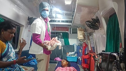 The 108 ambulance crew with the baby delivered 