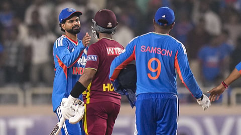West Indies' captain Shai Hope shakes hands with India's Shreyas Iyer after winning the second T20I cricket match of a series between India and West Indies, in Ranchi, Jharkhand.
