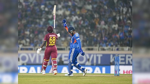 West Indies' Sherfane Rutherford returns after dismissal during the second T20I cricket match of a series between India and West Indies, in Ranchi, Jharkhand.