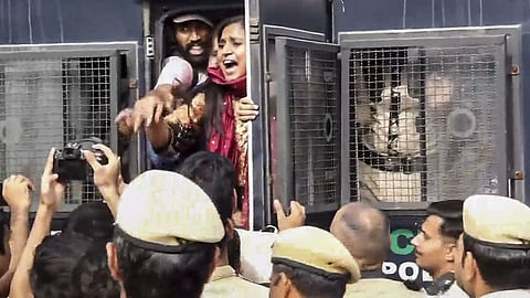 Detained Cockroach Janta Party (CJP) supporters during a demonstration against Chief Election Commissioner (CEC) Gyanesh Kumar, at Connaught Place, in New Delhi.