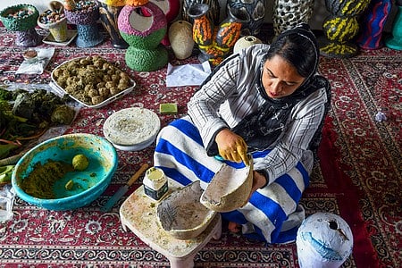 A handicraft artist working to meet new demands