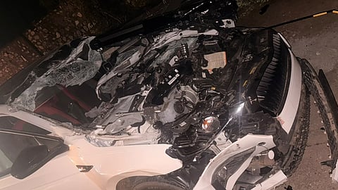 Mangled remains of the ill-fated car